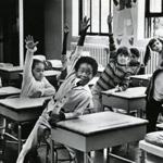 Sept. 5, 1979: A show of hands to volunteer to be the line leaders on the first day of school for second graders at the Elliot School in the North End.